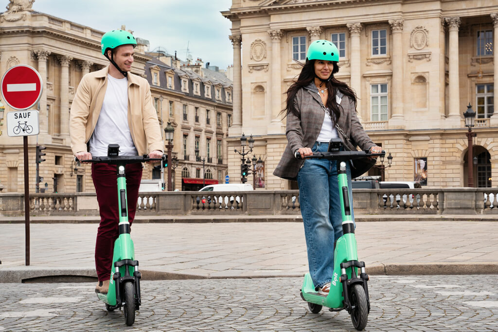 Riders on Bolt scooter