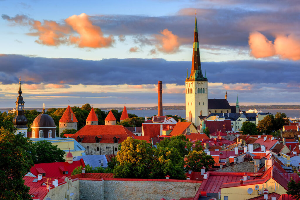 St. Olaf's Church and medieval watch towers in the old town of Tallinn, Estonia, on sunset