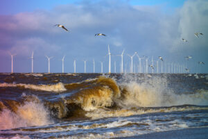 Wind turbines in an offshore wind park during a storm