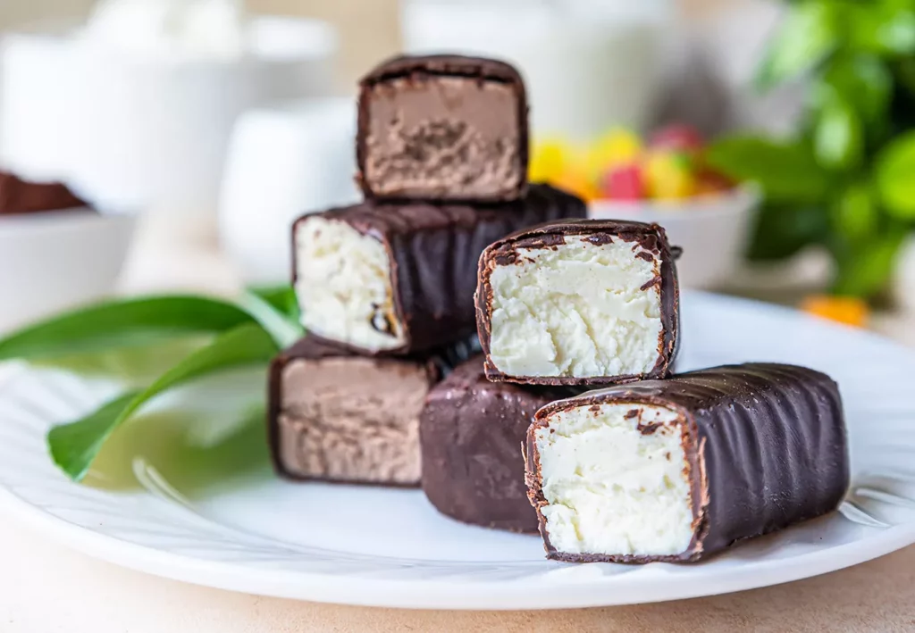 Cottage cheese rods or bars in chocolate glaze. Delicious breakfast. Traditional Hungarian dessert Turo Rudi
