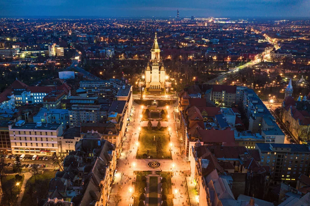 Beautiful red sunset in aerial view from Timisoara taken by a professional drone - Timisoara Orthodox Cathedral, Bega and Central Park