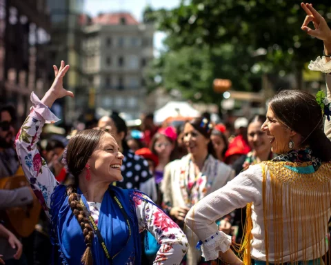 Members of Roma community parade through Old Town of Prague during the Khamoro World Roma Festival