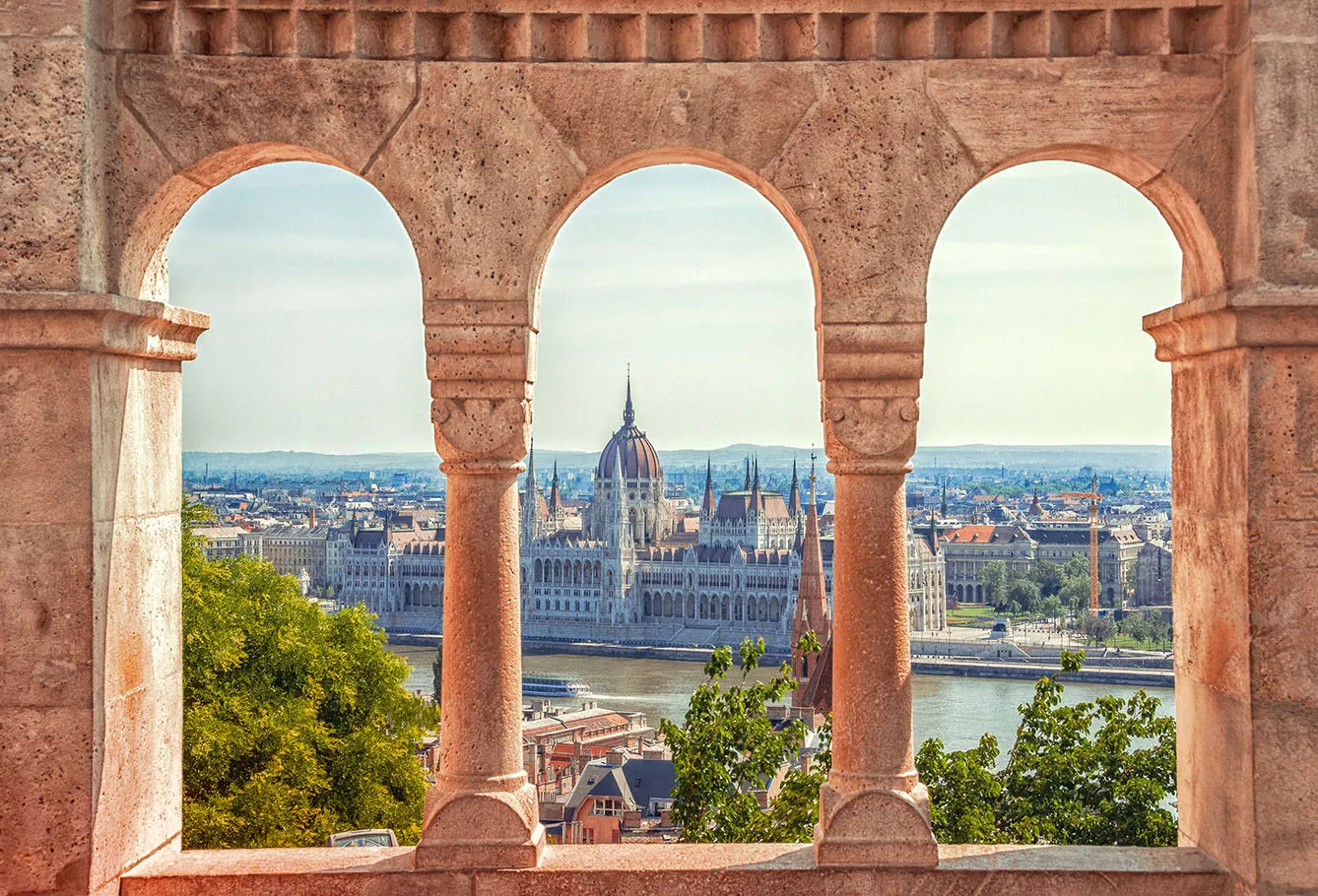 Parliament view through Fishermans Bastion in Budapest