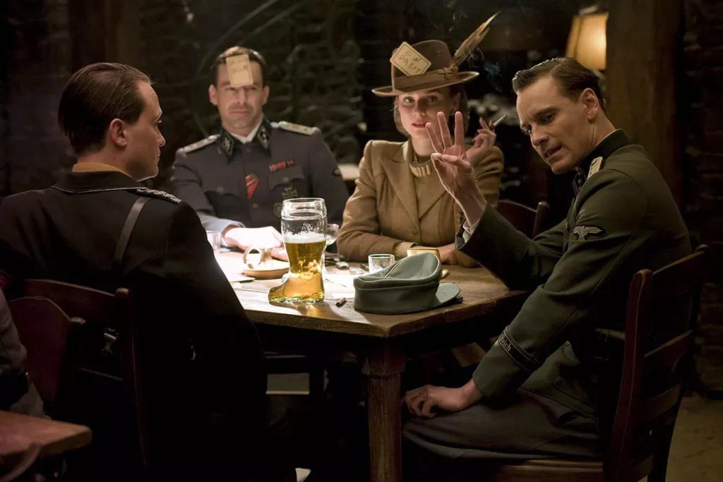 still from Inglourious basterds movie with August Diehl, Gedeon Burkhard, Diane Kruger, Michael Fassbender