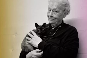 Hungarian doctor and journalist Edith Bone holds a cat