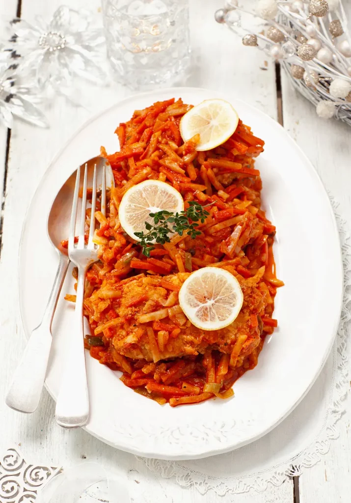 Fish with vegetables in tomato sauce for Christmas