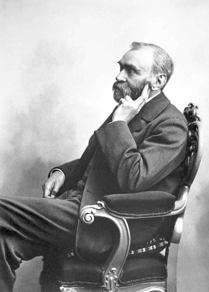 Alfred Nobel sits on chair