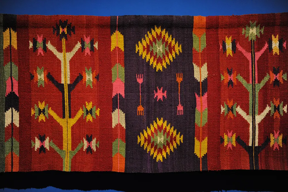 Rug, probably made for sale. 1890-1902. From Andrasfalva (Maneuti, Romania). Ethnographic Museum in Budapest, Hungary