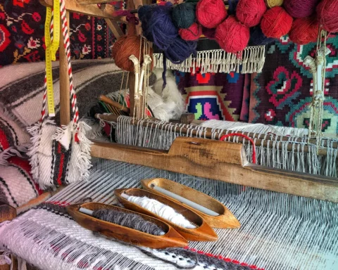Closeup of a weaving loom with colorful ropes stock photo Romania, Tradition, Wool, Loom, Art