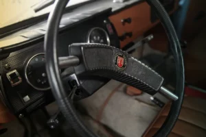 The steering wheel of a 1977 ARO car