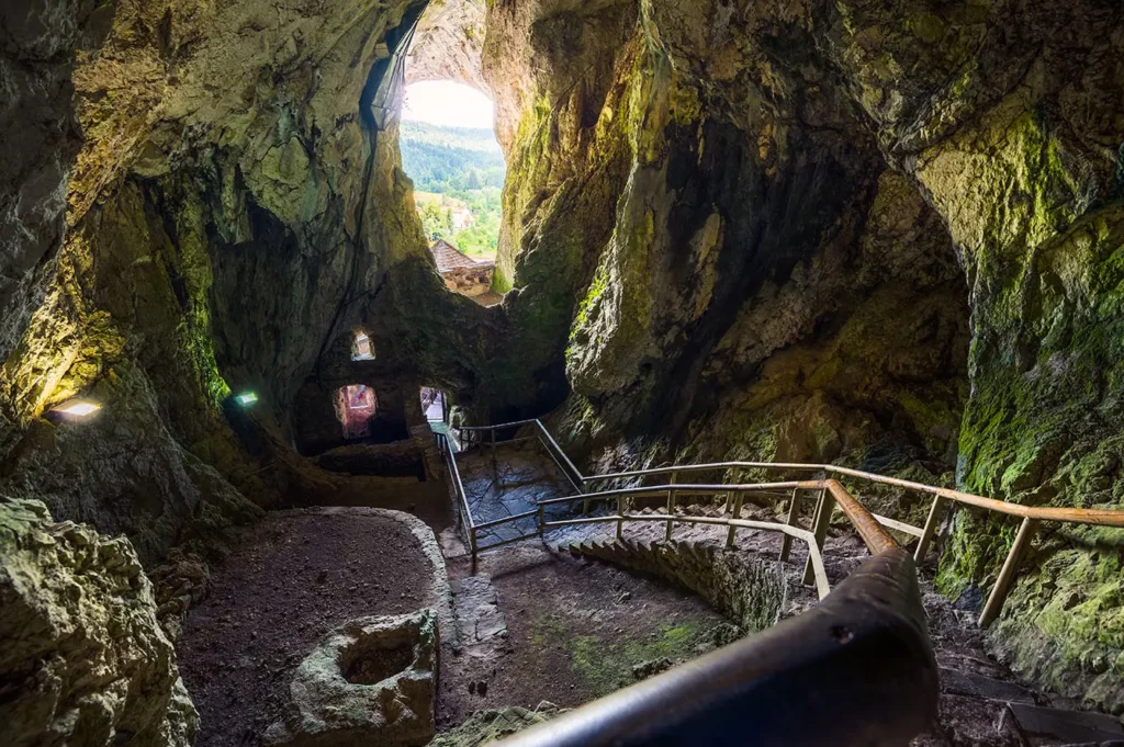 Cave Interior with Stone Staircase of Predjama Castle in Slovenia