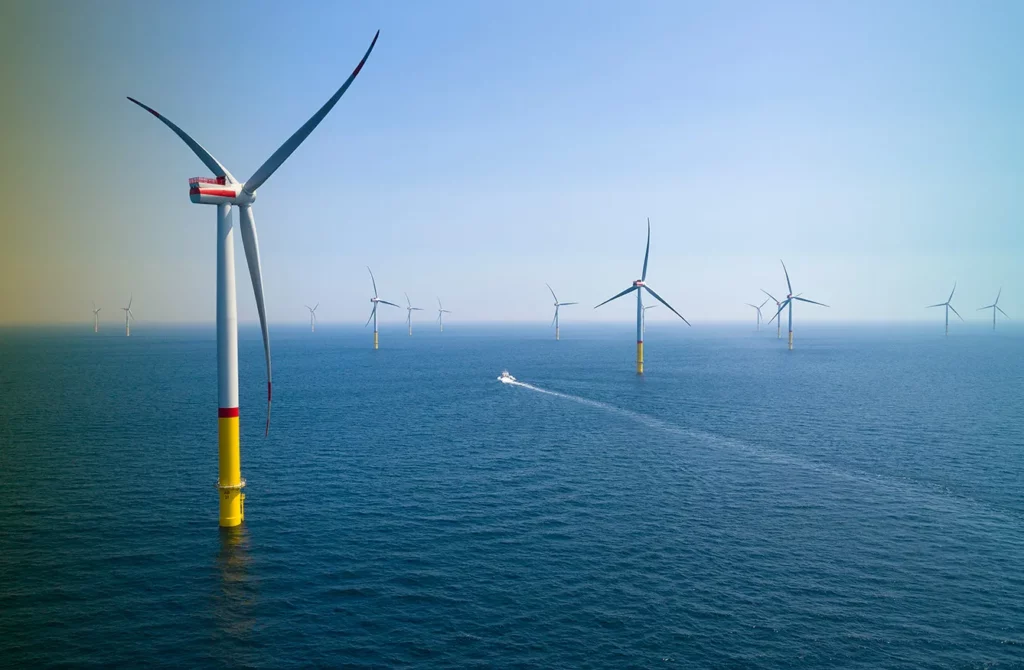 Arkona Offshore Wind Park. In this aerial view wind turbines stand at the recently-inaugurated Arkona offshore wind park in the Baltic Sea on June 5, 2019 off the coast of Sassnitz, Germany. The Arkona wind park, operated by E.ON, consists of 60 wind turbines that generate a total of 385 MW of electricity. Germany has made a strong push towards renewable energy sources over the last decade and recently announced a timetable for ending German coal-based electricity production
