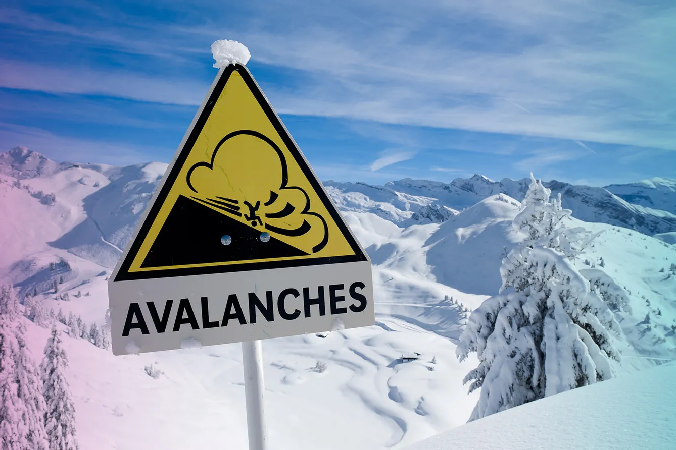 Avalanche sign in winter Alps with snow