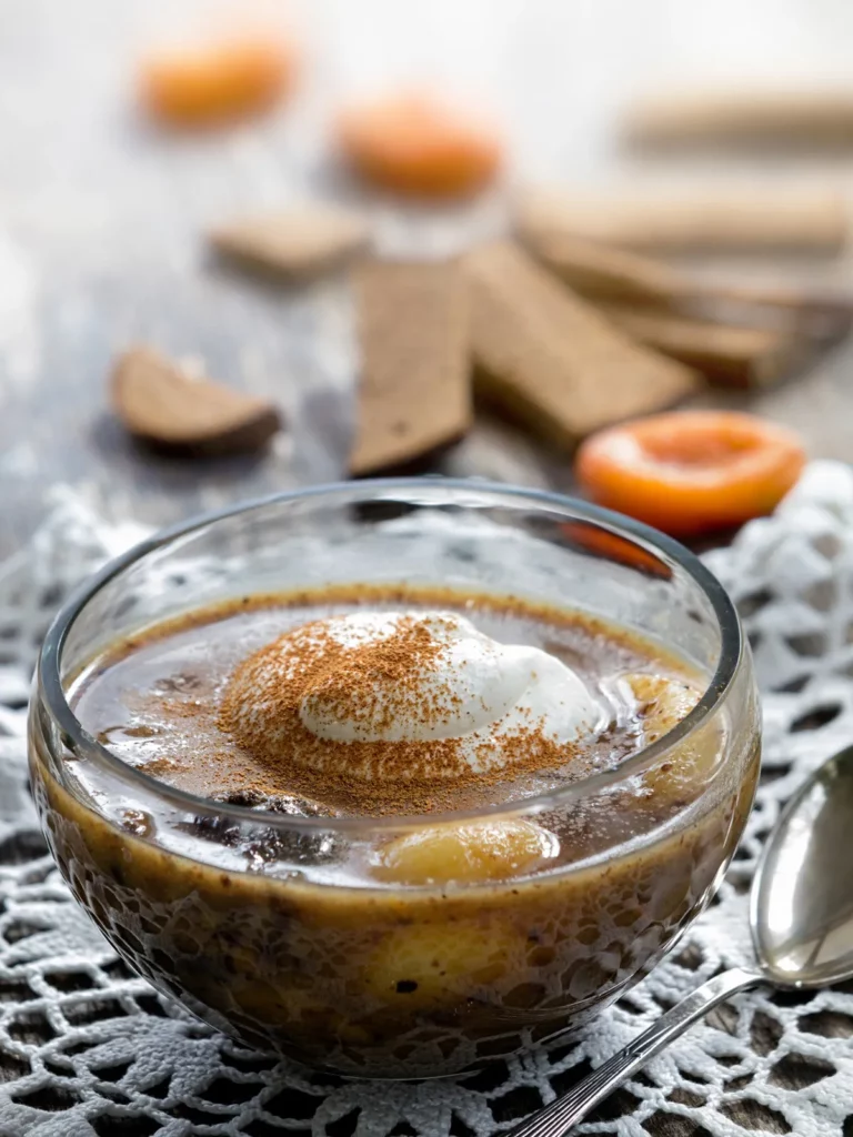 Rye bread dessert with whipped cream and cinnamon