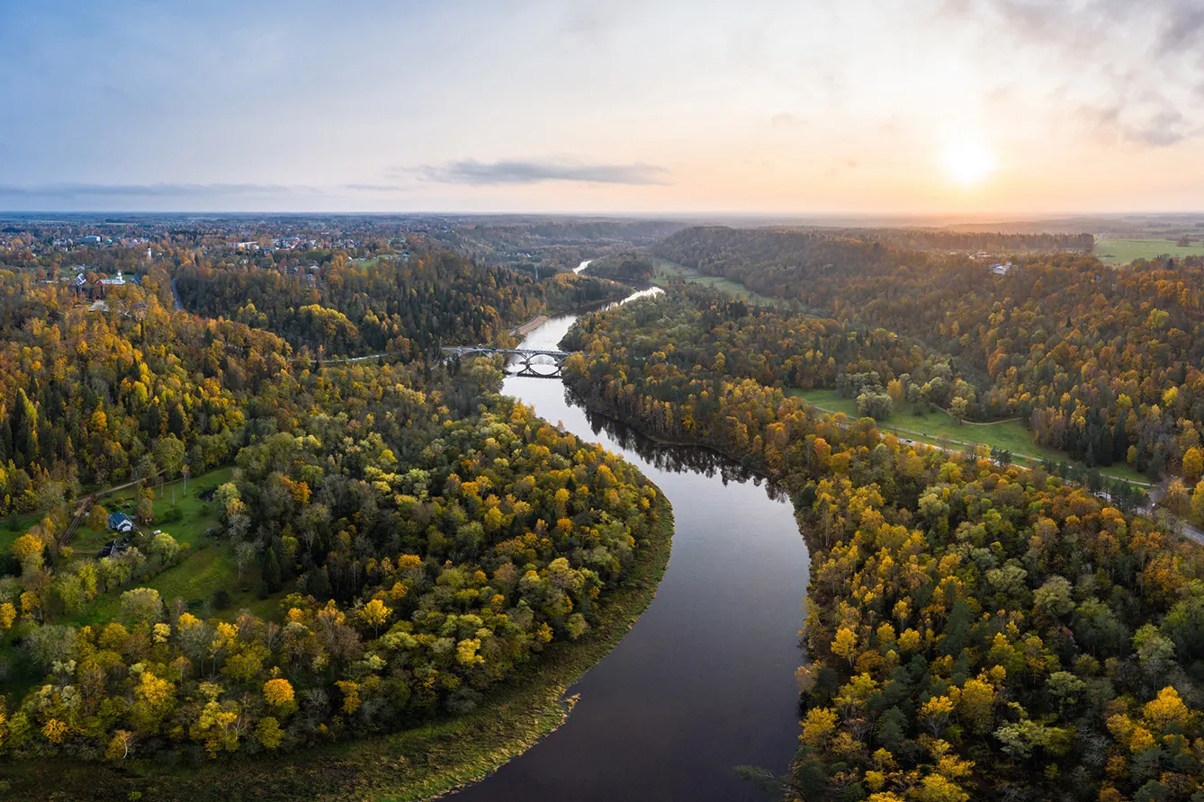 River Gauja in autumn next to Sigulda, Latvia. Photo taken on from a drone