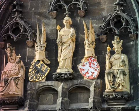 Statues of Wenceslas IV, St Vitus and Emperor Charles IV on the Old Town Bridge Tower at Charles Bridge, Prague, Czech Republic