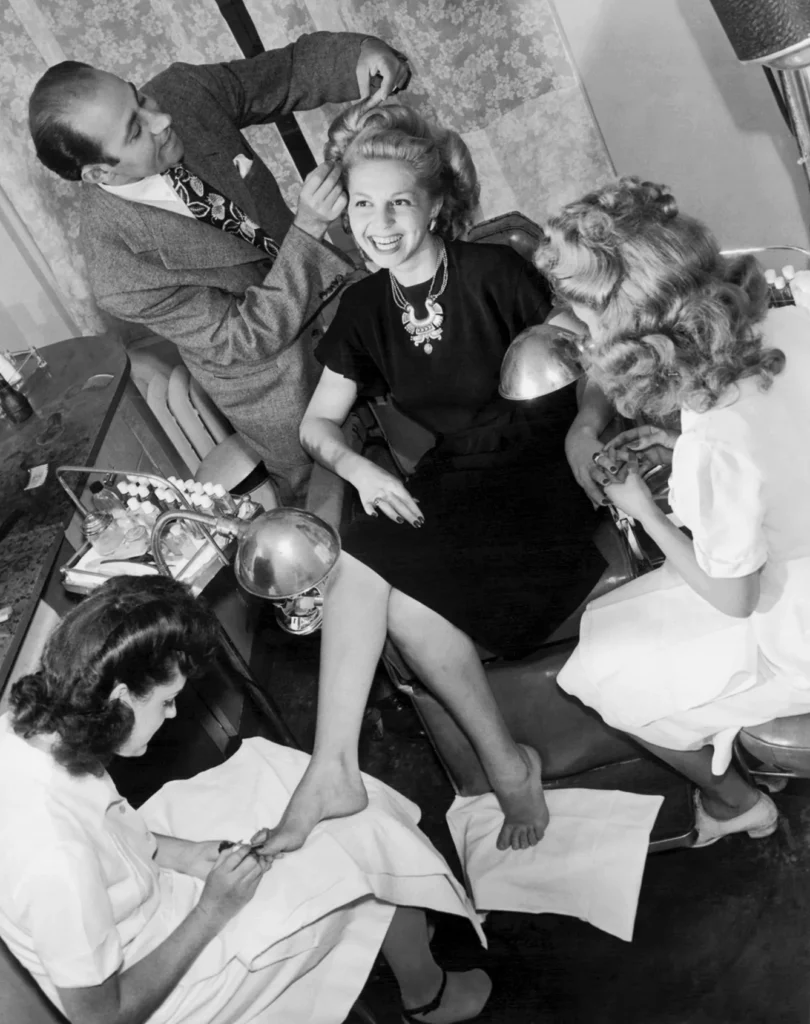 Beauty Salon Glamorizing. A young woman has a complete beauty treatment including feet, hands, and hair at the Helena Rubenstein beauty salon, New York, September 3, 1943.