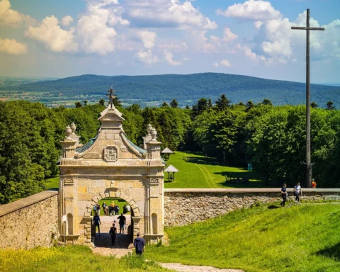 Lysa Gora, Swiety Krzyz mount hilltop with gate to medieval Benedictive Abbey and sanctuary in Swietokrzyskie Mountains near Nowa Slupia village in Poland.
