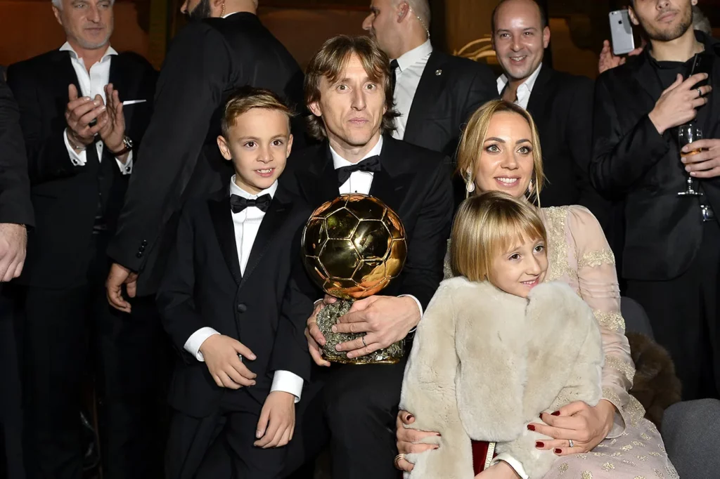Luka Modric of Croatia and Real Madrid poses with his wife Vanja Bosnic and their children Ivano and Ema after he wins the 2018 Ballon D'Or at Le Grand Palais on December 3, 2018 in Paris, France