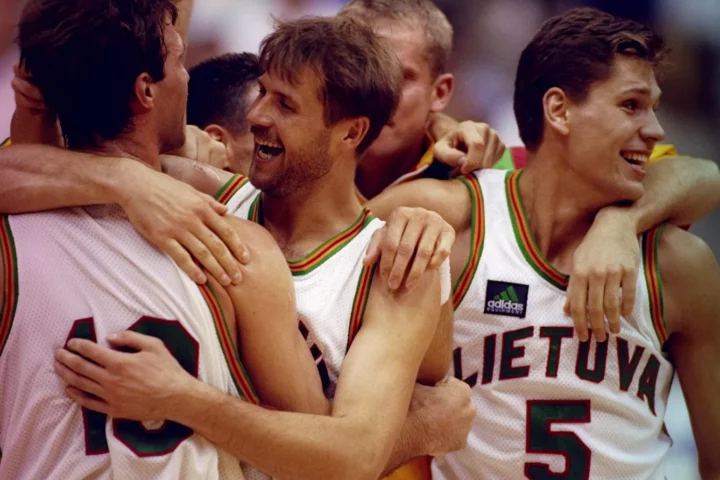 8 Aug 1992: Team Lithuania celebrates after winning the bronze at the Olympic Games in Barcelona, Spain.