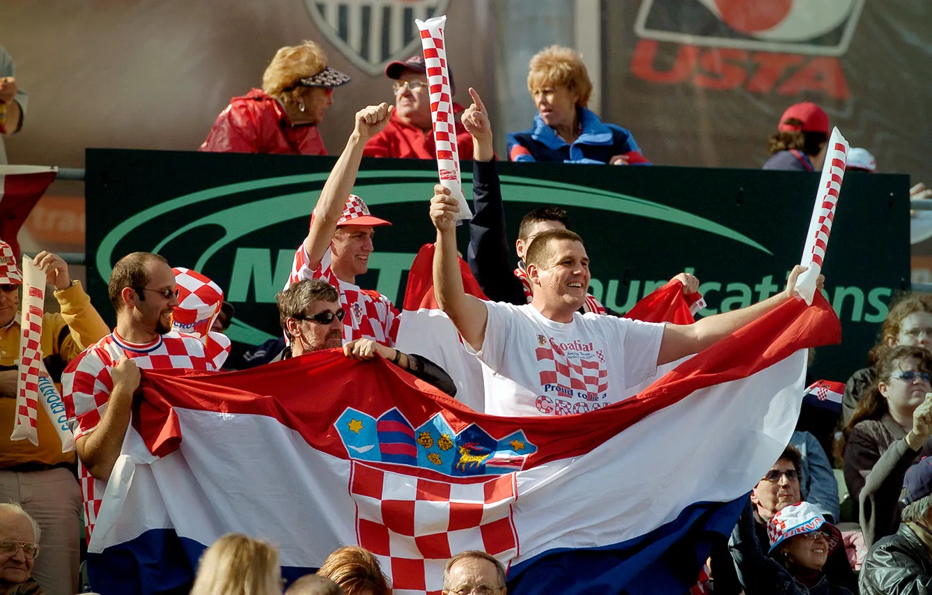 Croatian fans from San Pedro, California cheer as Andre Agassi (USA) losses to Ivan Ljubicic (CRO) during the first round of the Davis Cup at the Home Depot Center in Carson, Calif. on March 4, 2005.