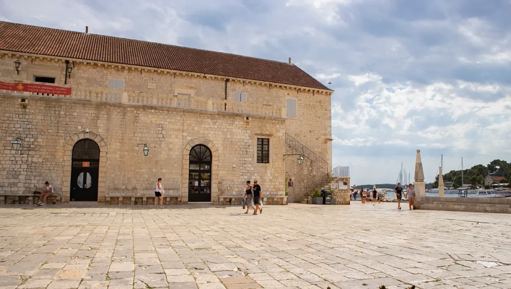 Hvar, Croatia-August 5th,2020: Hvar town theatre, former navy arsenal building on the St. Stephen square, biggest in the adriatic region.