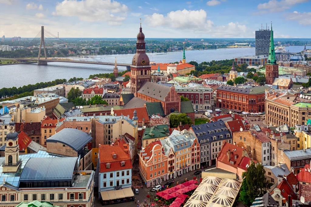 A view over central Riga, Latvia, with Riga Cathedral and Daugava River in the background.