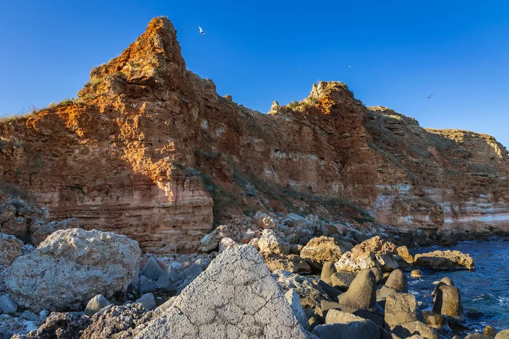 Rocks seen from Bolata Beach, located in Kaliakra Nature Reserve over Black Sea in Bulgaria.