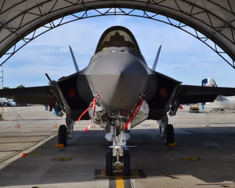 The F-35 Joint Strike Fighter stands in the hangar forward.