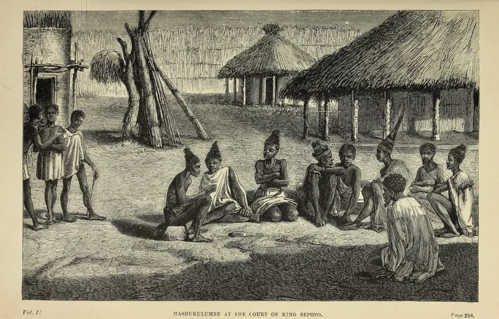 "Mashukulumbe at the court of King Sepopo" from Seven Years in South Africa (1881) by Emil Holub, translated by Ellen Elizabeth Frewer, illustrated by Karel Liebscher, Adolf Liebscher and Johann Varrone.