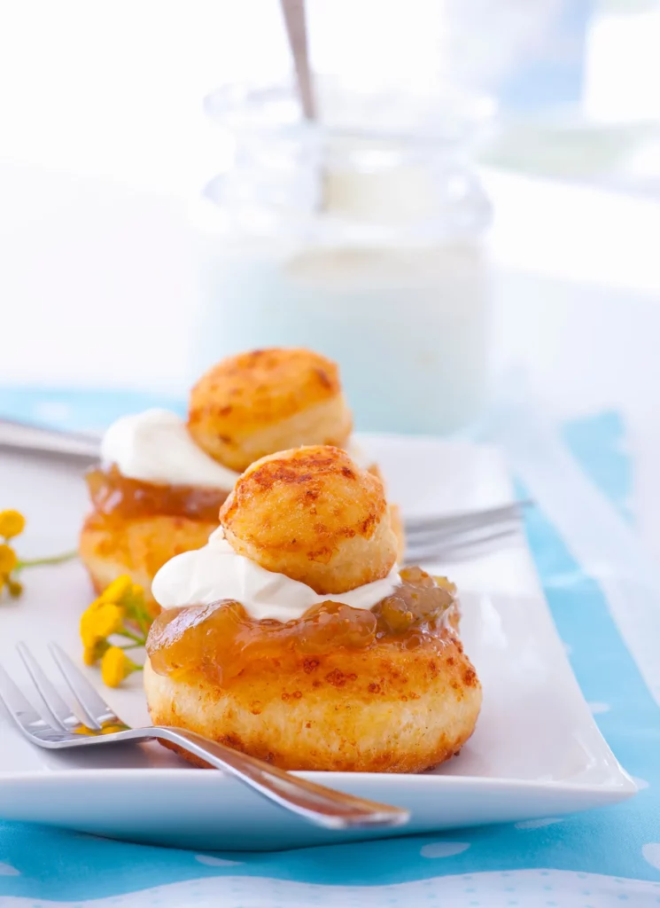 Papanasi (Romanian doughnuts) with fig jam