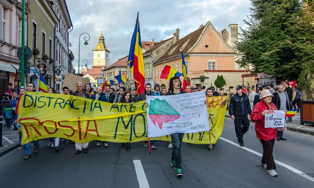 Brasov, Romania - September 15, 2013: Peoples protesting against the Romanian government support for a plan to open EuropeAaas biggest open-cast gold mine in the small Carpathian town of Rosia Montana.