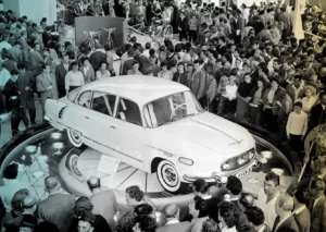 to the First International Trade Fair at Brno, admire a Czech-made "Tatra -603" car on show in one of the three large engineering exhibitions.