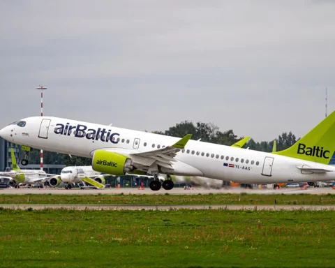 Riga, Latvia - August 31, 2021: AirBaltic Airbus takes off from RIX International Airport on cloudy autumn day.