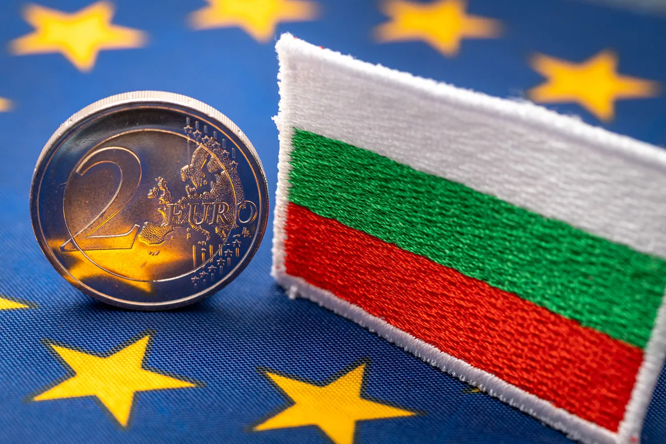 The flag of Bulgaria against the background of the single currency of the European Union, The concept of Bulgaria joining the Euro zone, economic and political background.
