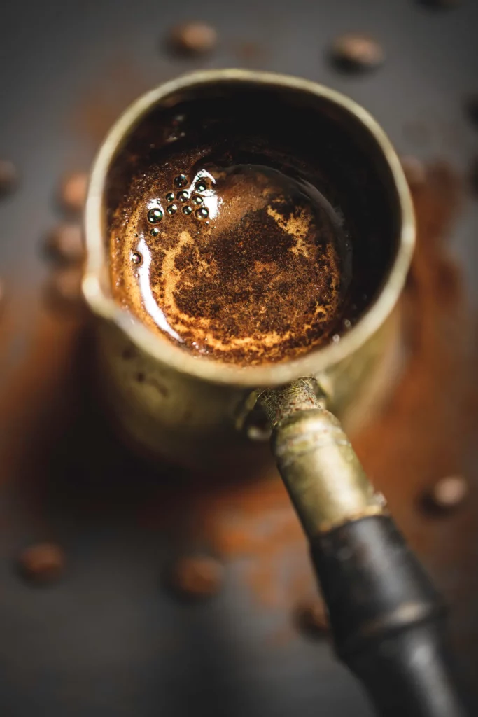 Coffee prepared in a special copper brewing pot