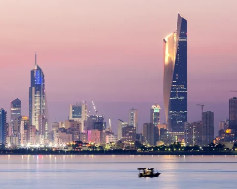 Skyline of Kuwait city at night, Middle East.