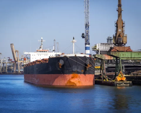 Cargo ship in commercial harbour, Swinoujscie, Poland.