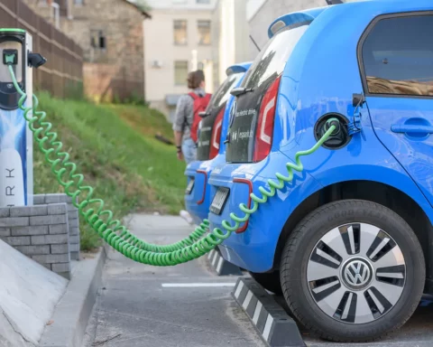 Vilnius, Lithuania - August 5, 2016: Electric car Volkswagen e-Up charging its batteries on a parking.