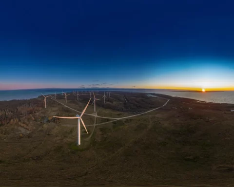An aerial drone view of the Wind Park in Paldiski, Estonia. Wind turbine farm.