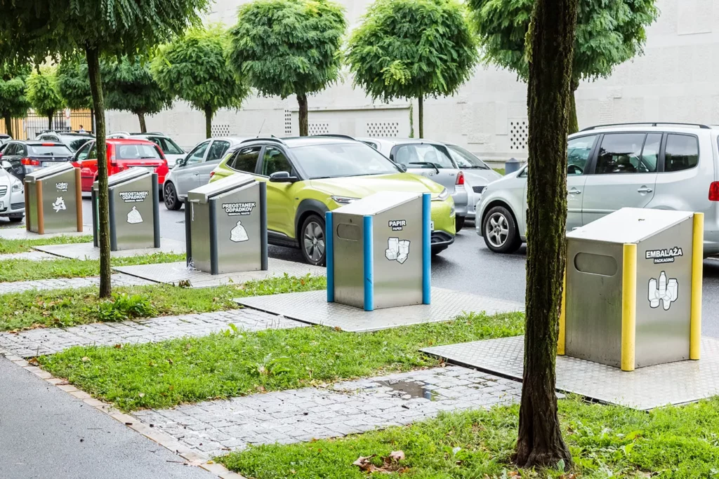 Ljubljana, Slovenia - 23 August, 2021: Modern system of underground garbage containers on the street. Separate garbage collection provides odor protection, large debris capacity, animal protection.